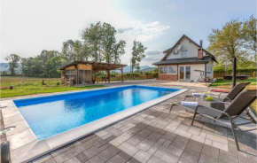 Beautiful home in Smiljan with Outdoor swimming pool, Sauna and 2 Bedrooms
